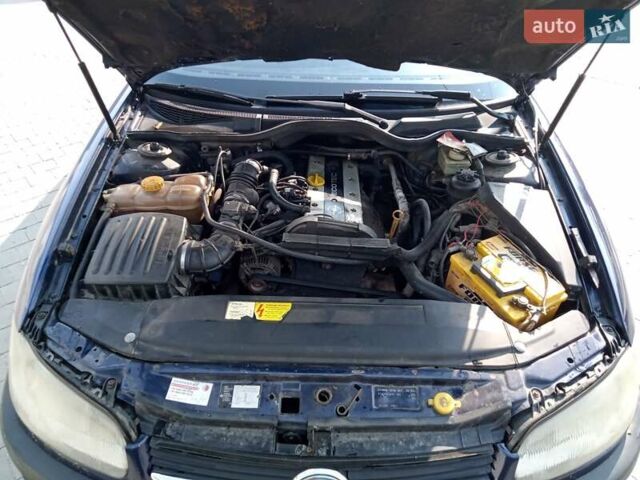 Синий Опель Омега, объемом двигателя 2 л и пробегом 450 тыс. км за 1300 $, фото 12 на Automoto.ua