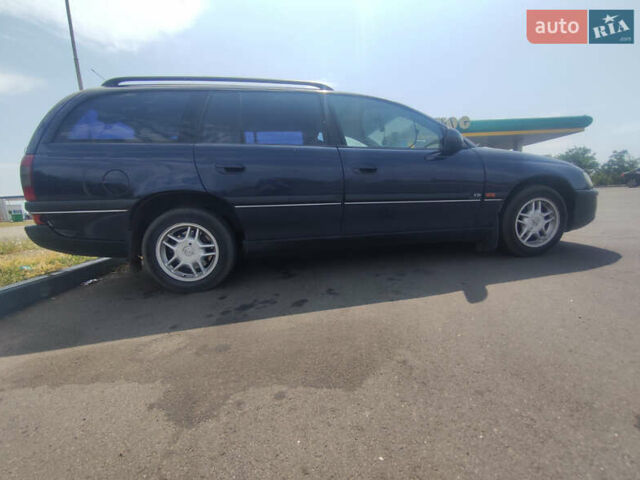 Опель Омега 1996 в Николаеве на Automoto.ua Синий Опель Омега, объемом двигателя 2.5 л и пробегом 335 тыс. км за 3500 $, фото 8 на Automoto.ua