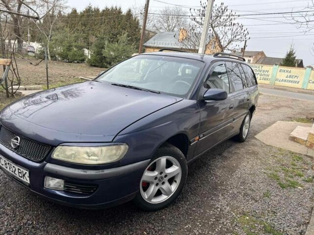 Синій Опель Омега, об'ємом двигуна 2 л та пробігом 343 тис. км за 1600 $, фото 3 на Automoto.ua