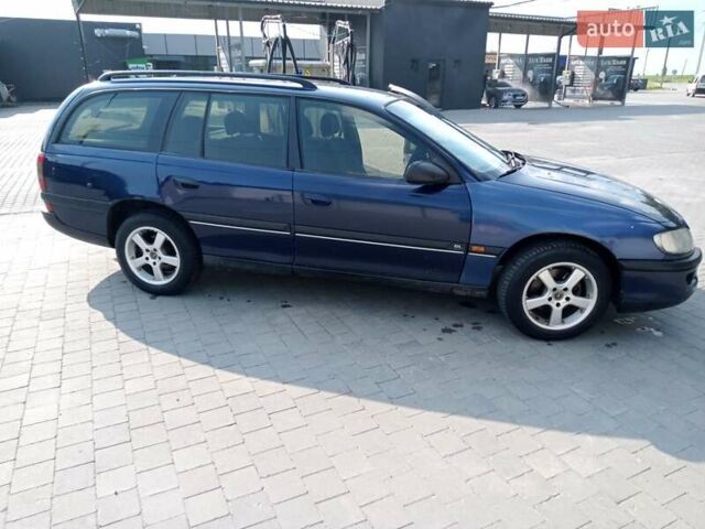 Синий Опель Омега, объемом двигателя 2 л и пробегом 450 тыс. км за 1300 $, фото 7 на Automoto.ua