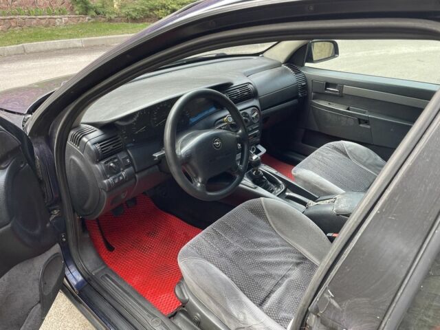 Синий Опель Омега, объемом двигателя 2 л и пробегом 350 тыс. км за 1250 $, фото 7 на Automoto.ua