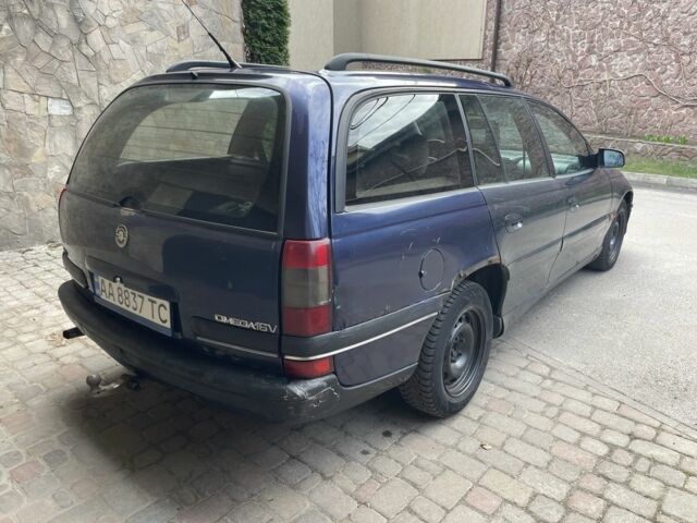 Синий Опель Омега, объемом двигателя 2 л и пробегом 350 тыс. км за 1250 $, фото 4 на Automoto.ua