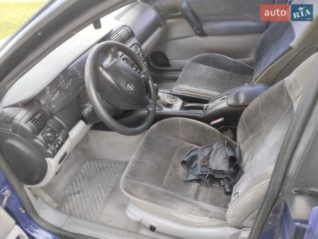 Синій Опель Омега, об'ємом двигуна 2 л та пробігом 306 тис. км за 1950 $, фото 11 на Automoto.ua