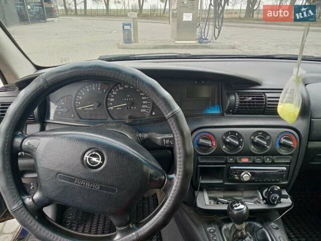 Синий Опель Омега, объемом двигателя 2 л и пробегом 450 тыс. км за 1300 $, фото 5 на Automoto.ua