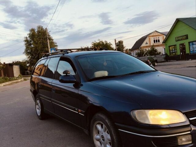 Синий Опель Омега, объемом двигателя 2 л и пробегом 268 тыс. км за 2500 $, фото 3 на Automoto.ua