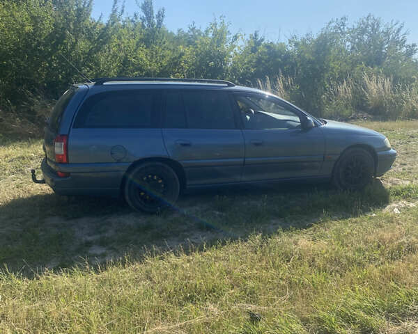 Синий Опель Омега, объемом двигателя 2 л и пробегом 184 тыс. км за 3800 $, фото 8 на Automoto.ua