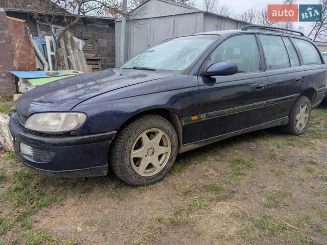 Синий Опель Омега, объемом двигателя 2.5 л и пробегом 400 тыс. км за 2400 $, фото 1 на Automoto.ua
