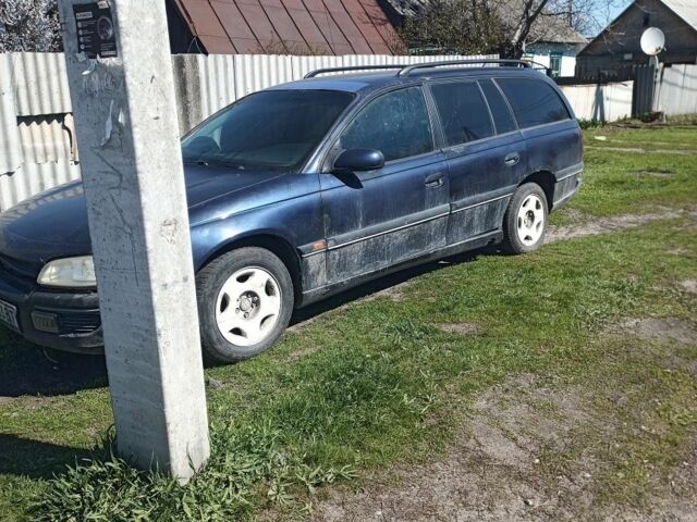 Синий Опель Омега, объемом двигателя 0 л и пробегом 350 тыс. км за 600 $, фото 5 на Automoto.ua