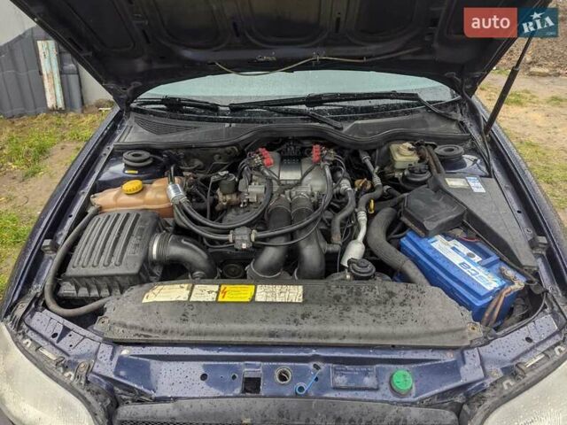 Синий Опель Омега, объемом двигателя 2.5 л и пробегом 400 тыс. км за 2400 $, фото 4 на Automoto.ua