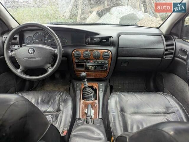 Синий Опель Омега, объемом двигателя 2.5 л и пробегом 400 тыс. км за 2400 $, фото 5 на Automoto.ua