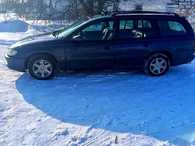 Синий Опель Омега, объемом двигателя 2.5 л и пробегом 400 тыс. км за 2500 $, фото 3 на Automoto.ua