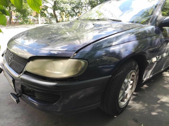 Синий Опель Омега, объемом двигателя 2.5 л и пробегом 378 тыс. км за 1786 $, фото 2 на Automoto.ua