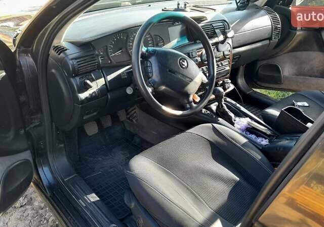 Синий Опель Омега, объемом двигателя 2 л и пробегом 298 тыс. км за 2999 $, фото 11 на Automoto.ua