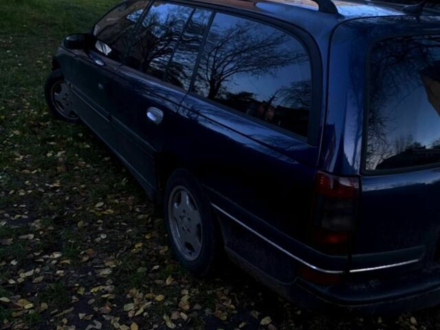 Синий Опель Омега, объемом двигателя 2.5 л и пробегом 312 тыс. км за 1750 $, фото 4 на Automoto.ua