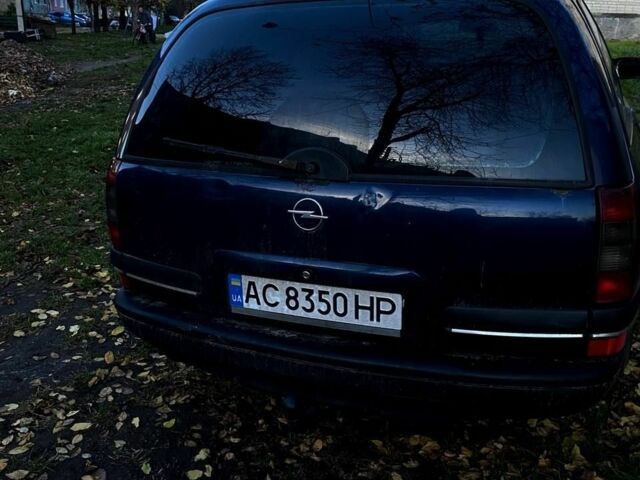 Синий Опель Омега, объемом двигателя 2.5 л и пробегом 312 тыс. км за 1750 $, фото 3 на Automoto.ua