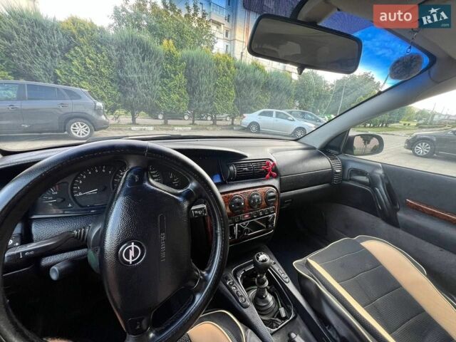Синій Опель Омега, об'ємом двигуна 2 л та пробігом 360 тис. км за 1199 $, фото 16 на Automoto.ua