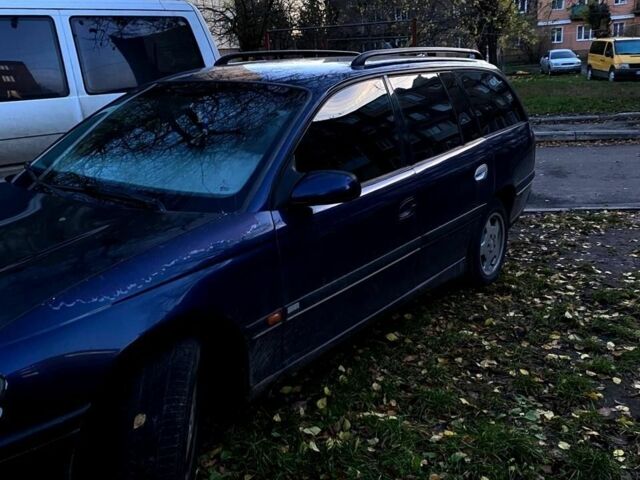Синий Опель Омега, объемом двигателя 2.5 л и пробегом 312 тыс. км за 1750 $, фото 6 на Automoto.ua