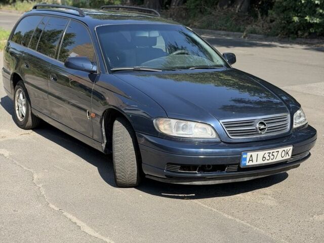 Синий Опель Омега, объемом двигателя 2.5 л и пробегом 333 тыс. км за 3003 $, фото 1 на Automoto.ua