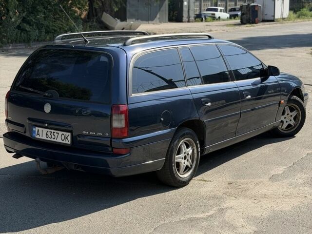 Синий Опель Омега, объемом двигателя 2.5 л и пробегом 333 тыс. км за 3003 $, фото 2 на Automoto.ua