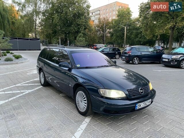 Синий Опель Омега, объемом двигателя 2.5 л и пробегом 355 тыс. км за 2450 $, фото 4 на Automoto.ua