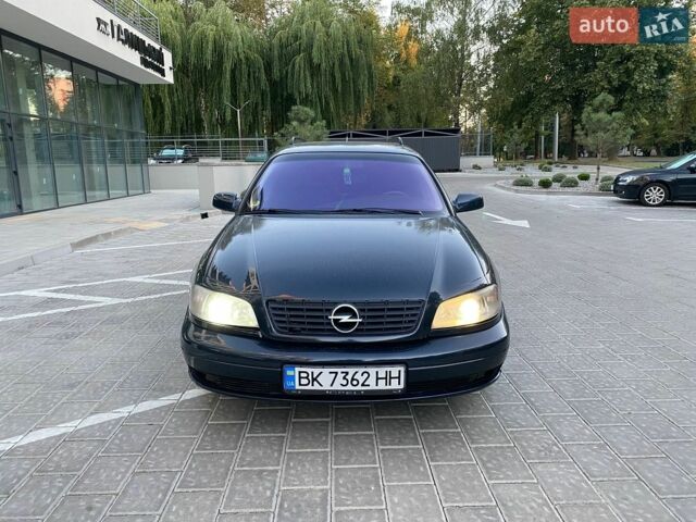 Синий Опель Омега, объемом двигателя 2.5 л и пробегом 355 тыс. км за 2450 $, фото 8 на Automoto.ua