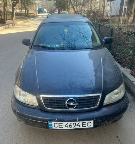 Синий Опель Омега, объемом двигателя 2.2 л и пробегом 265 тыс. км за 1999 $, фото 1 на Automoto.ua
