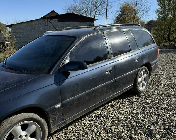 Опель Омега 2003 в Черновцах на Automoto.ua Синий Опель Омега, объемом двигателя 2.17 л и пробегом 300 тыс. км за 3000 $, фото 6 на Automoto.ua