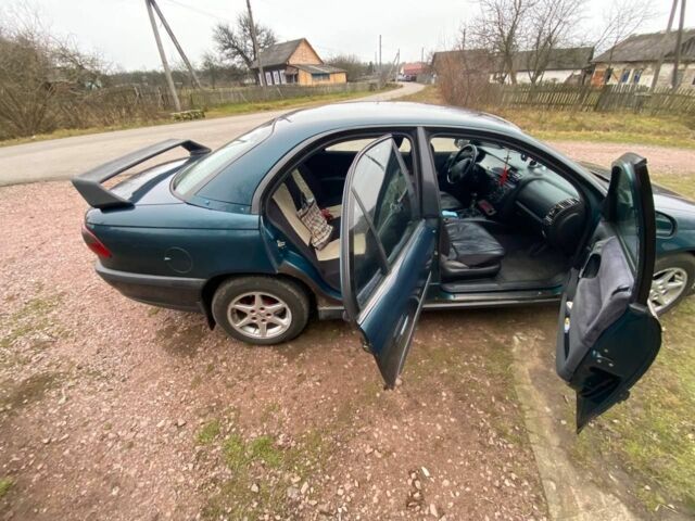 Зелений Опель Омега, об'ємом двигуна 2 л та пробігом 2 тис. км за 2600 $, фото 3 на Automoto.ua