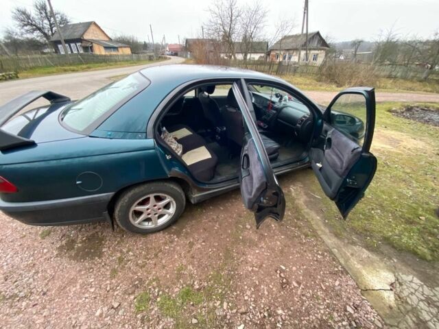 Зелений Опель Омега, об'ємом двигуна 2 л та пробігом 2 тис. км за 2600 $, фото 4 на Automoto.ua