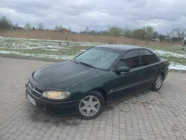 Зелений Опель Омега, об'ємом двигуна 2.5 л та пробігом 777 тис. км за 2500 $, фото 7 на Automoto.ua