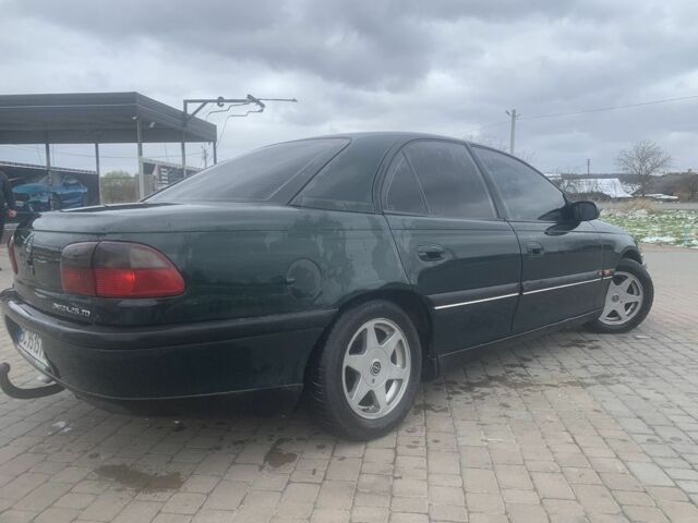 Зелений Опель Омега, об'ємом двигуна 2.5 л та пробігом 777 тис. км за 2500 $, фото 3 на Automoto.ua