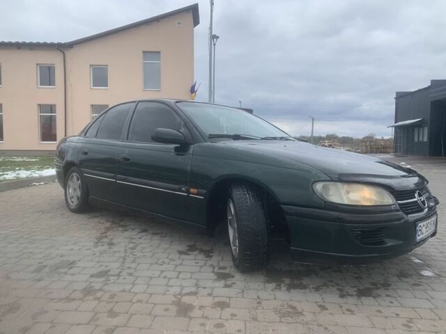 Зелений Опель Омега, об'ємом двигуна 2.5 л та пробігом 777 тис. км за 2500 $, фото 9 на Automoto.ua