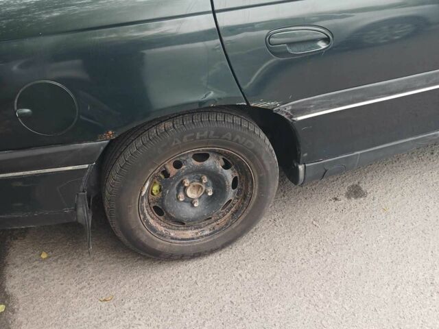 Зеленый Опель Омега, объемом двигателя 2 л и пробегом 350 тыс. км за 1000 $, фото 4 на Automoto.ua