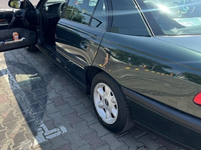 Зеленый Опель Омега, объемом двигателя 2 л и пробегом 350 тыс. км за 4000 $, фото 5 на Automoto.ua