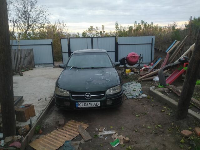 Зеленый Опель Омега, объемом двигателя 2.5 л и пробегом 100 тыс. км за 1100 $, фото 2 на Automoto.ua