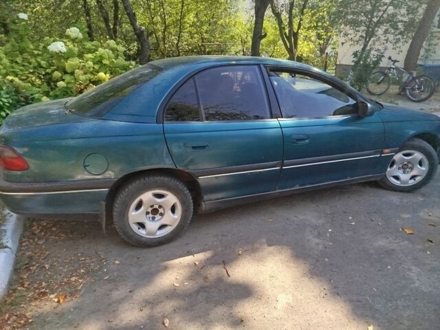 Зеленый Опель Омега, объемом двигателя 1.9 л и пробегом 250 тыс. км за 1800 $, фото 1 на Automoto.ua