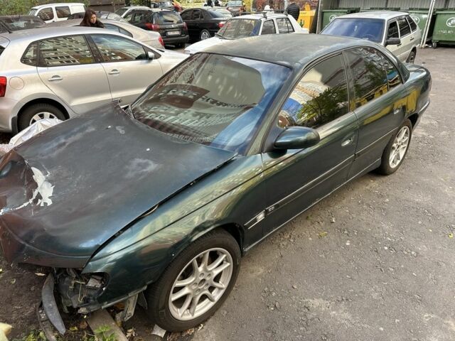 Зелений Опель Омега, об'ємом двигуна 2.5 л та пробігом 250 тис. км за 1157 $, фото 3 на Automoto.ua