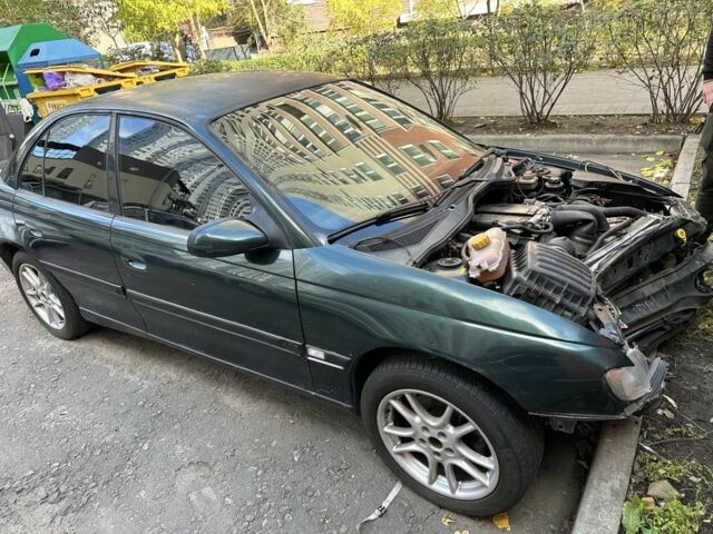 Зелений Опель Омега, об'ємом двигуна 2.5 л та пробігом 250 тис. км за 1157 $, фото 4 на Automoto.ua