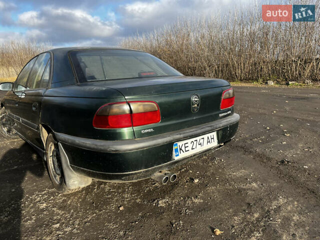 Зелений Опель Омега, об'ємом двигуна 2.96 л та пробігом 300 тис. км за 1350 $, фото 8 на Automoto.ua