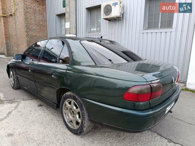 Зеленый Опель Омега, объемом двигателя 2 л и пробегом 321 тыс. км за 1100 $, фото 4 на Automoto.ua