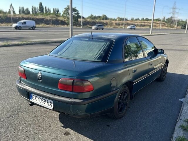 Зеленый Опель Омега, объемом двигателя 2 л и пробегом 200 тыс. км за 850 $, фото 5 на Automoto.ua