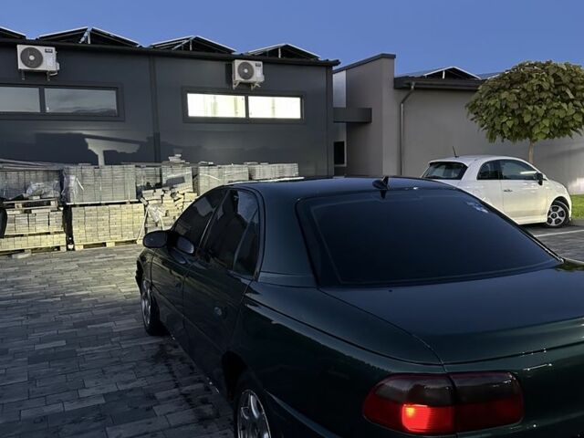 Зеленый Опель Омега, объемом двигателя 2 л и пробегом 250 тыс. км за 1400 $, фото 2 на Automoto.ua