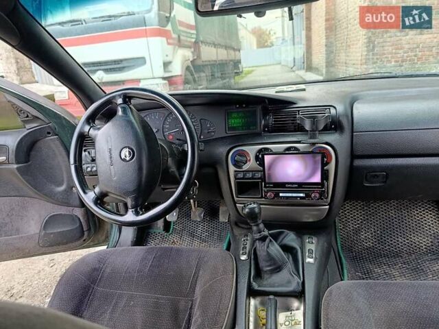 Зеленый Опель Омега, объемом двигателя 2 л и пробегом 321 тыс. км за 1100 $, фото 16 на Automoto.ua