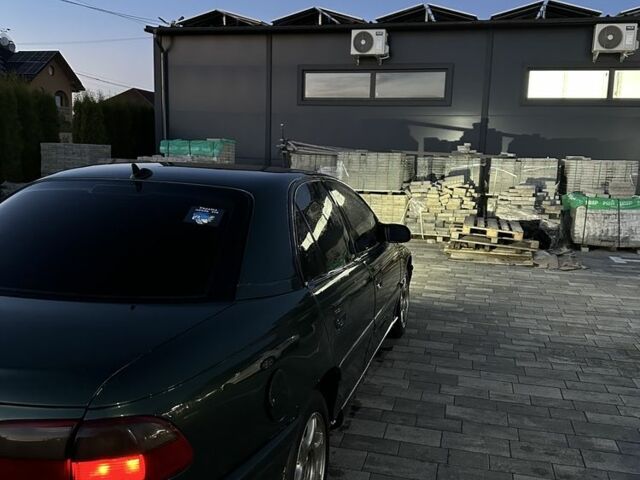 Зеленый Опель Омега, объемом двигателя 2 л и пробегом 250 тыс. км за 1400 $, фото 3 на Automoto.ua