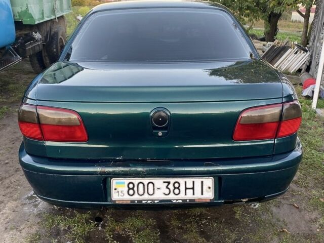 Зелений Опель Омега, об'ємом двигуна 2 л та пробігом 439 тис. км за 1069 $, фото 4 на Automoto.ua