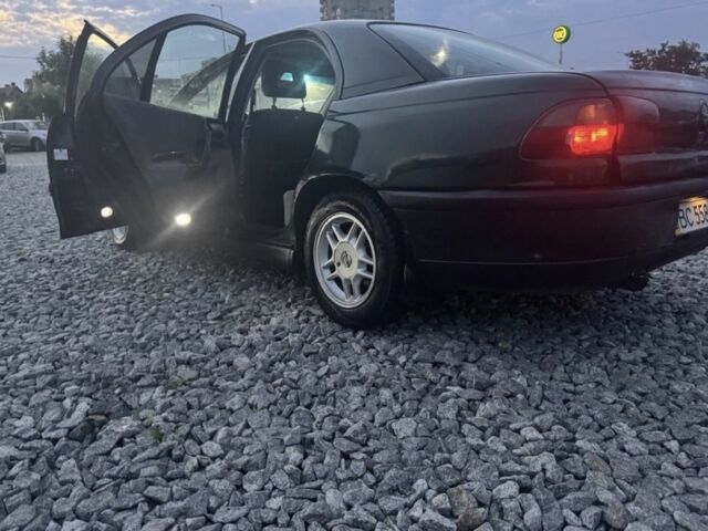 Зеленый Опель Омега, объемом двигателя 2 л и пробегом 372 тыс. км за 1400 $, фото 4 на Automoto.ua