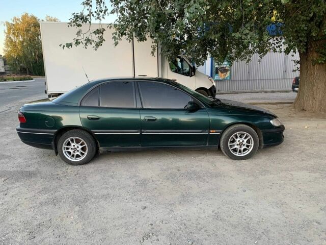 Зеленый Опель Омега, объемом двигателя 2 л и пробегом 300 тыс. км за 1600 $, фото 7 на Automoto.ua