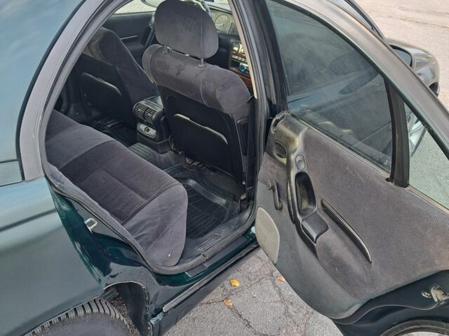 Зеленый Опель Омега, объемом двигателя 2 л и пробегом 280 тыс. км за 1950 $, фото 11 на Automoto.ua