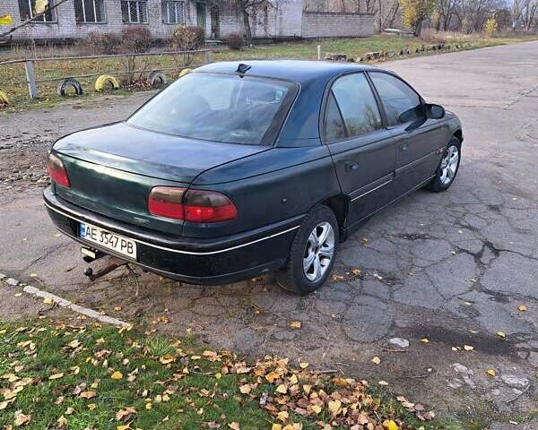 Зелений Опель Омега, об'ємом двигуна 2 л та пробігом 280 тис. км за 1899 $, фото 3 на Automoto.ua