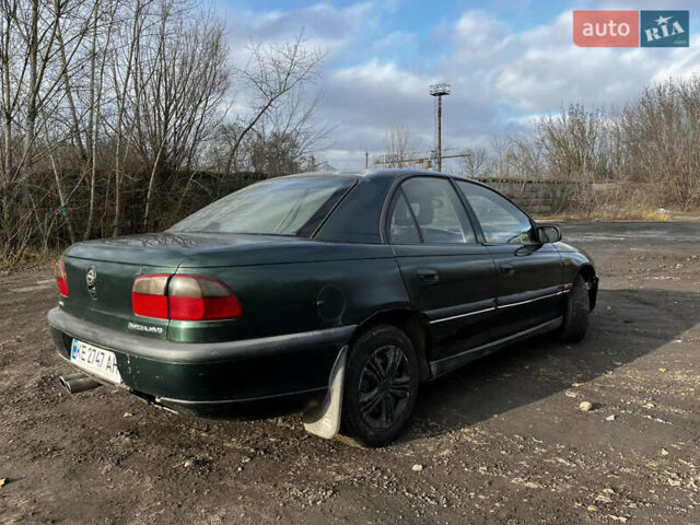 Зелений Опель Омега, об'ємом двигуна 2.96 л та пробігом 300 тис. км за 1350 $, фото 10 на Automoto.ua